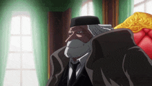 a man with a beard is wearing a hat and a coat