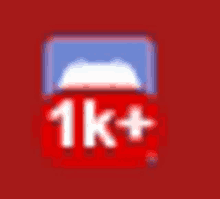 a blurred image of a 1k+ icon on a red background .