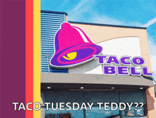 a taco bell sign is displayed on a building