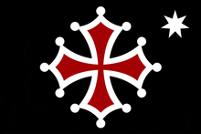 a red and white cross on a black background with a white star