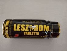 a bottle of lesz rom tablets with a strawberry on the label