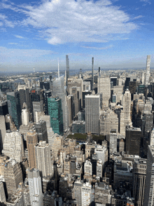 an aerial view of a city with lots of buildings