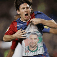 lionel messi is wearing a shirt with a picture on it