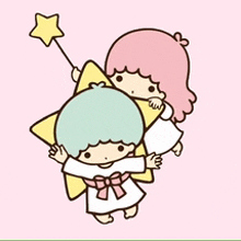 a boy and a girl are hugging each other and holding a star .