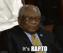 a man in a suit and tie is saying it 's rapto .