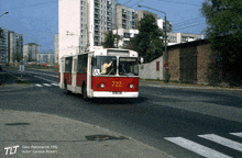 a red bus with the number 7222 on it