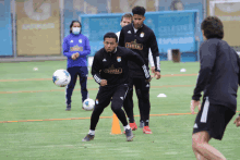 a group of soccer players with one wearing a shirt that says cristal on it