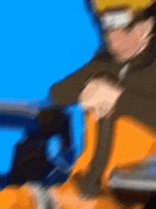 a blurry picture of a person in a naruto outfit