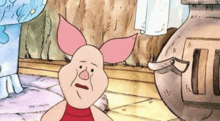 piglet from winnie the pooh is making a sad face while standing next to a pot .