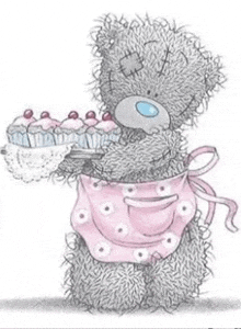 a teddy bear in a pink apron is holding a tray of cupcakes .