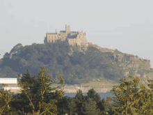 a picture of a castle on top of a hill was taken on june 23rd 2020