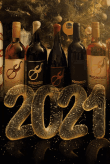 several bottles of prohibido wine are lined up in front of the year 2021