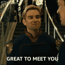 a man says great to meet you while standing next to stairs