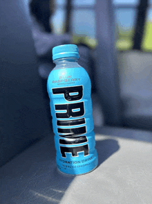 a blue bottle of blue raspberry flavored prince hydration drink