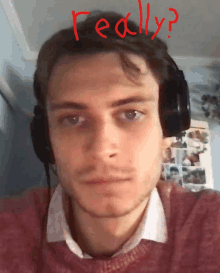 a man wearing headphones has the word really written in red