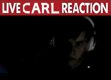 a man wearing headphones with the words live carl reaction behind him