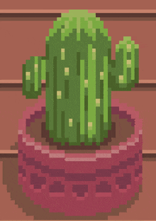 a pixel art cactus in a pink pot on a wooden table