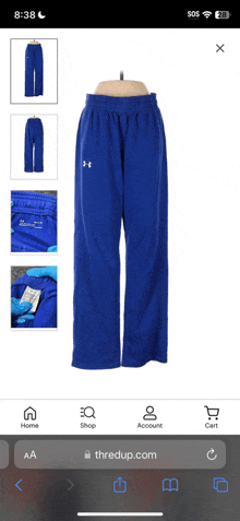 a picture of a pair of blue under armour sweatpants on thredup.com