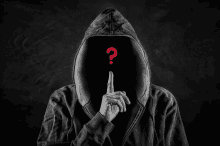 a person in a hoodie has a red question mark in front of their face