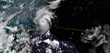 a satellite image of a hurricane with a red line going through it