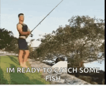 a man is standing on a rock holding a fishing rod and saying i 'm ready to catch some fish .