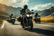 a group of motorcycle riders are riding down a mountain road