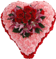 a heart made of pink and red flowers with red roses