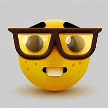 a cartoon smiley face wearing glasses and a smile .