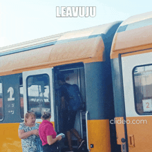 a man is boarding a train with the caption leavuju