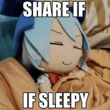 a stuffed doll is laying in a bed with the words share if if sleepy