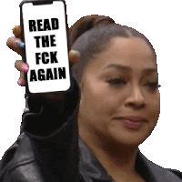 a woman is holding up a cell phone that says " read the fck again "