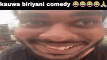 a close up of a man 's face with the words kawa biryani comedy written above it