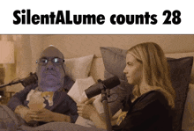 a man with glasses sits next to a woman with the words silentalume counts 28