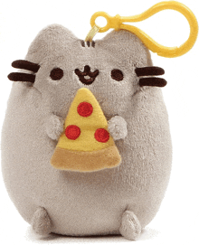 a stuffed cat holding a slice of pizza with red dots on it