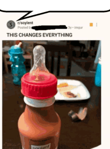 a bottle of soylent sits on a table with a plate of food in the background