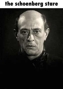 a black and white photo of a bald man with the words the schoenberg stare above him