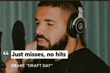 a man wearing headphones is singing into a microphone with a quote that says " just misses no hits drake draft day "