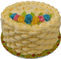 a basket shaped cake with roses and pearls on it