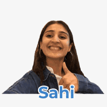 a woman is smiling and giving a thumbs up with the name sahi behind her