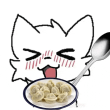 a cat is eating a plate of dumplings with a spoon in front of it .