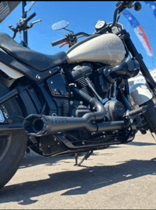 a harley davidson motorcycle is parked on the side of a road