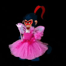 a cartoon monkey wearing a pink dress with wings