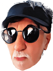 a man wearing sunglasses and a hat has a reflection in his glasses