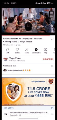 a phone screen shows a video titled brahmanandam as angry man hilarious comedy scene ii volga videos