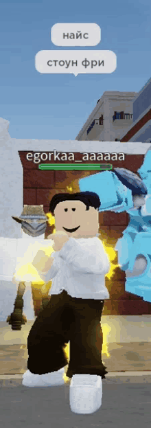 a man in a white shirt is standing in front of a brick wall with the name egorkaa_aaaaaa on it