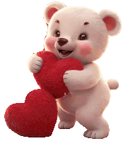 a teddy bear is holding a red heart in its paws