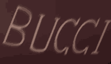 a brown background with the word bucci written in white