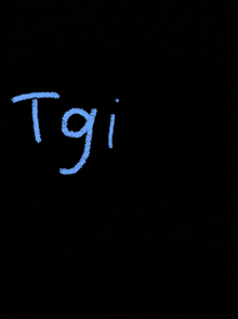 the word tgi is written in blue chalk on a blackboard