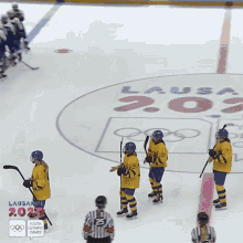 a hockey game is being played at the lausanne youth olympic games in 2022