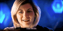 a close up of a woman 's face with the words " i love this bit " next to her